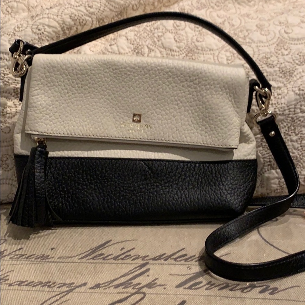 Like new white and black Kate spade purse